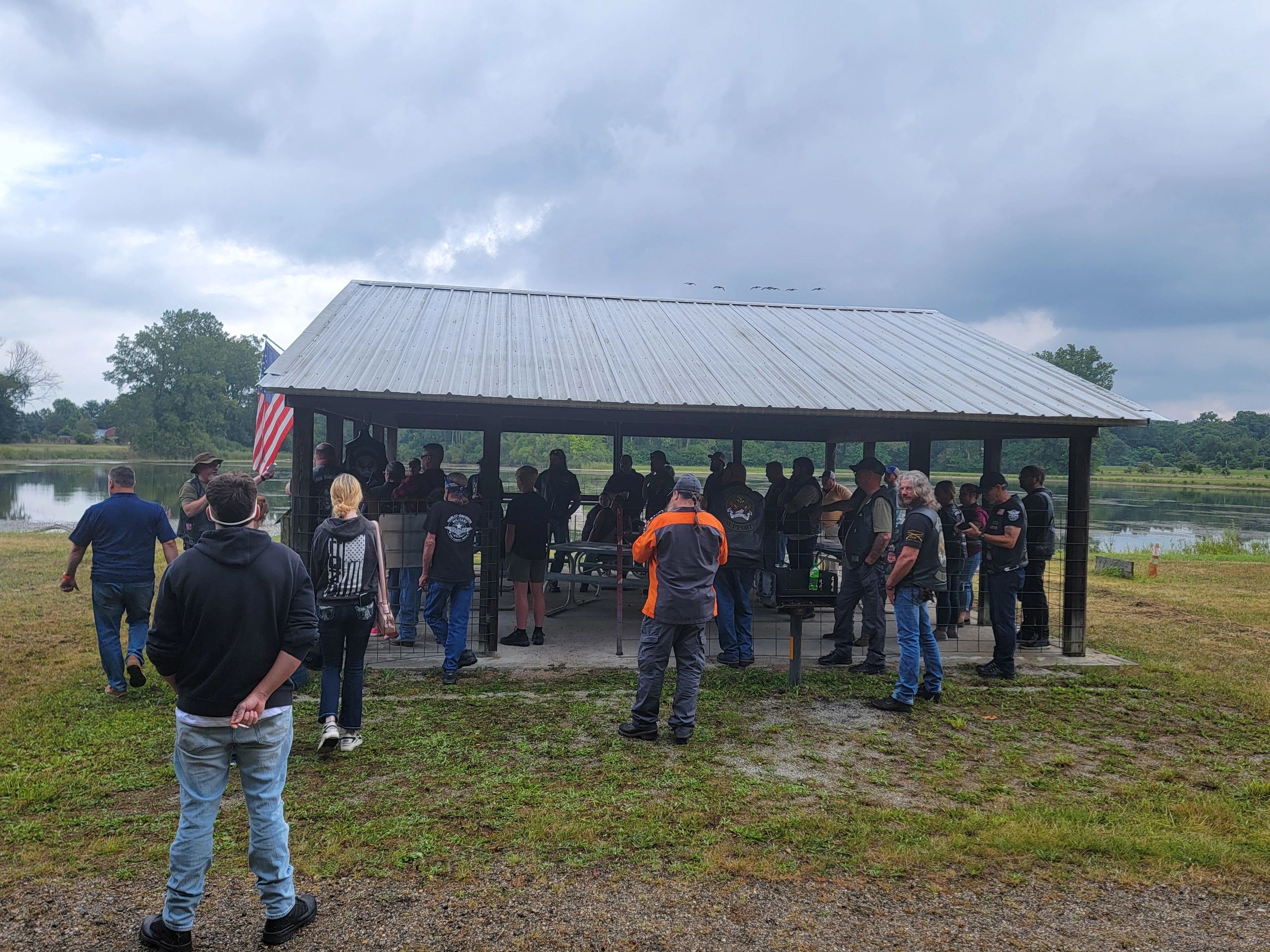 Community gathering at riverside pavilion