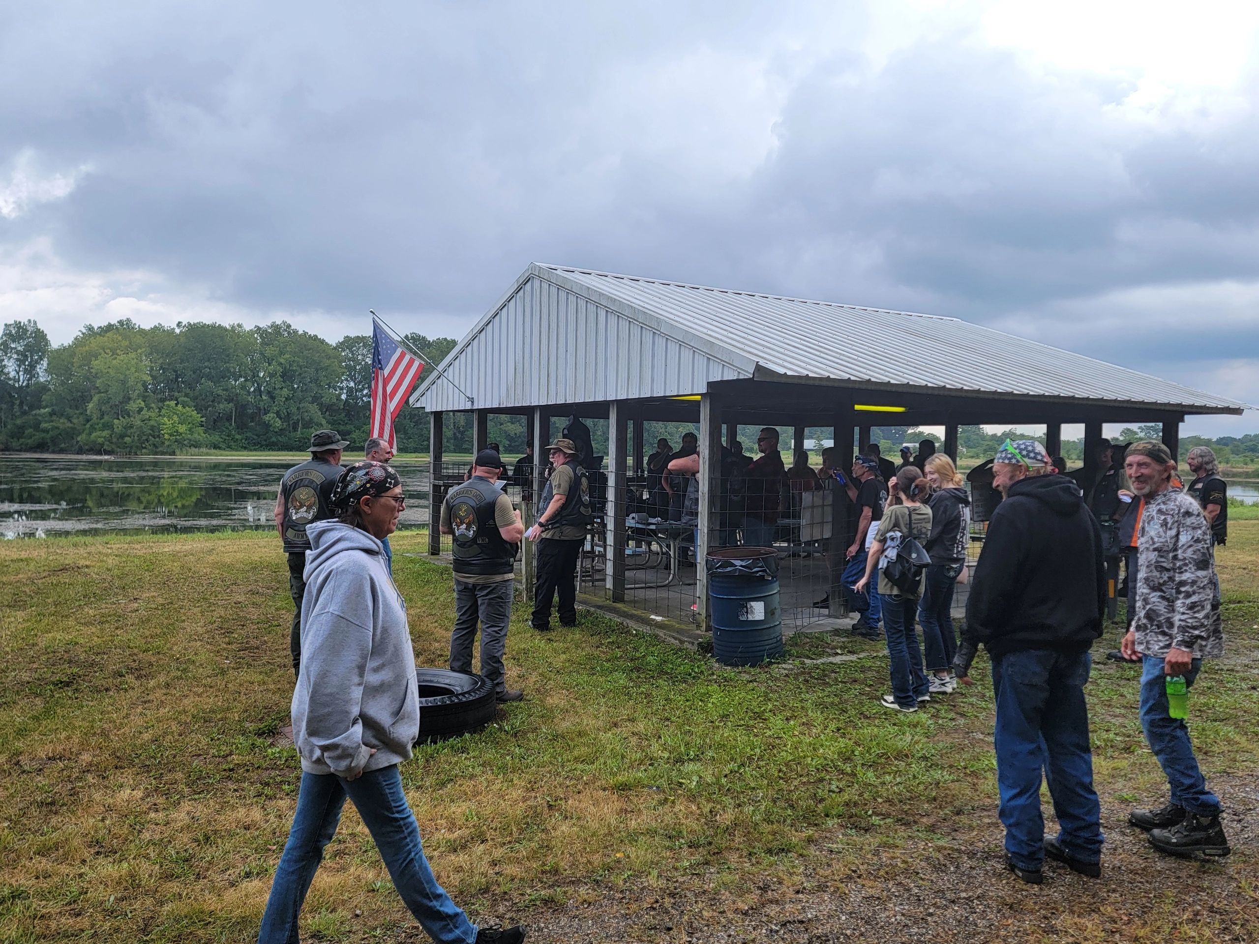Outdoor gathering at riverside pavilion